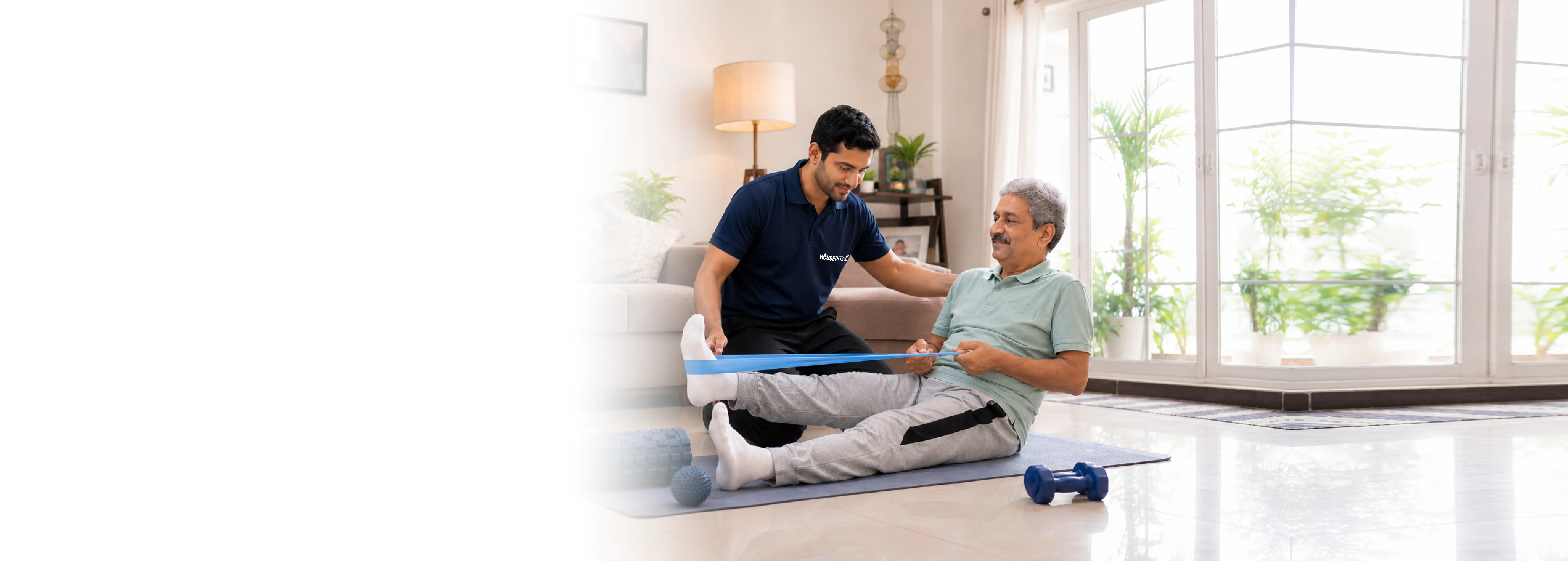 Physiotherapist guiding an elderly patient through resistance-band exercises at home